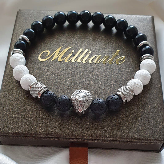 Herren Armband aus Lava weiß, Lava schwarz und Onyx mit Löwenkopf-Charm in Geschenkbox mit Logo, Ansicht oben
